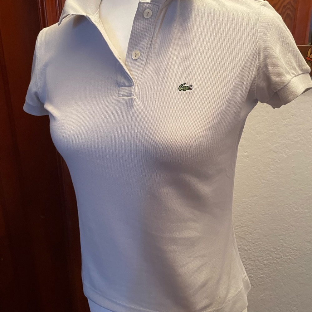 Lacoste Polo shirt. Light grey. Excellent condition.